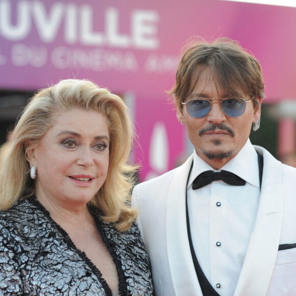 Catherine Deneuve et Johnny Depp à la première du film "Waiting For The Barbarians" lors du 45éme festival du Cinéma Américain de Deauville, France, le 8 septembre 2019. 