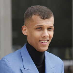 Stromae - People à la sortie du défilé de mode "Louis Vuitton", collection prêt-à-porter automne-hiver 2015/2016, à Paris. Le 11 mars 2015