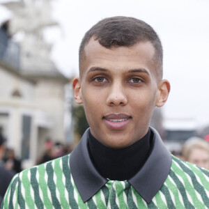 Stromae - Défilé de mode prêt-à-porter Automne Hiver 2015, 2016. Valentino dans les jardins des Tuileries à Paris. Le Mardi 10 Mars 2015