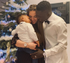 Le footballeur Idrissa Gana Gueye, son épouse Pauline et leur fils Isaac. Décembre 2019.
