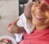 Christina Milian déjeune avec son fils Kenna sur l'épaule. Le 5 mai 2021.