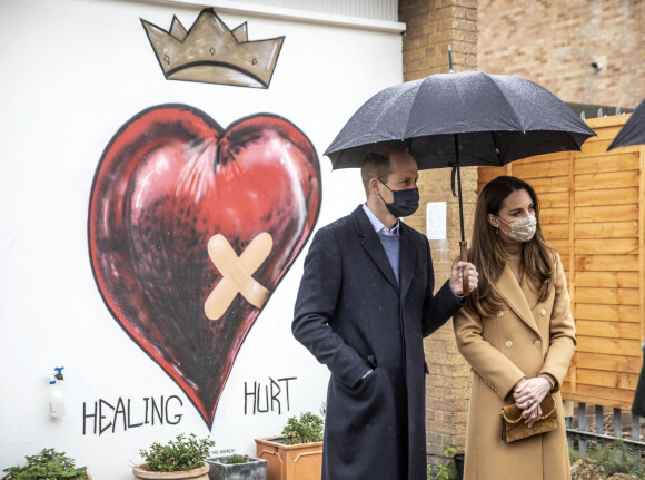 Le prince William, duc de Cambridge, et Catherine (Kate) Middleton, duchesse de Cambridge, lors d'une visite à la station d'ambulance de Newham à Londres, Royaume Uni, le 18 mars 2021.