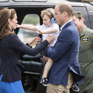 Kate Middleton, Le prince William et leur fils le prince George assistent au Royal International Air Tattoo à Cirencester le 8 juillet 2016.