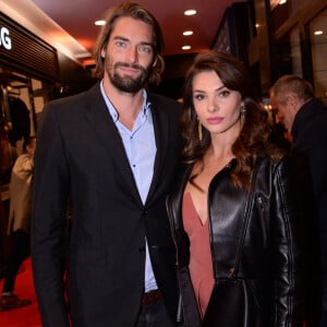 Camille Lacourt et sa compagne Alice Detollenaere (Miss Bourgogne 2010) lors de la soirée de réouverture de la boutique "Breitling", située rue de la Paix. Paris, le 3 octobre 2019. © Rachid Bellak/Bestimage