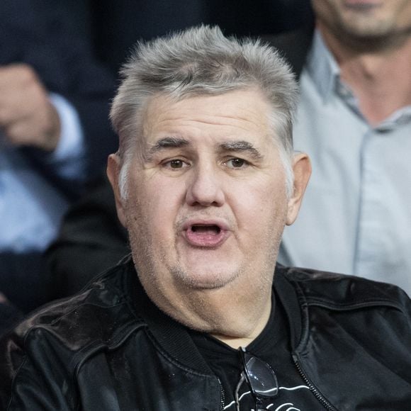 Pierre Ménès dans les tribunes lors du match UEFA Ligue des Champions groupe A, opposant le Paris Saint-Germain (PSG) au Real Madrid au Parc des Princes à Paris, France, le 18 septembre 2019. Le PSG a gagné 3-0. © Cyril Moreau/Bestimage