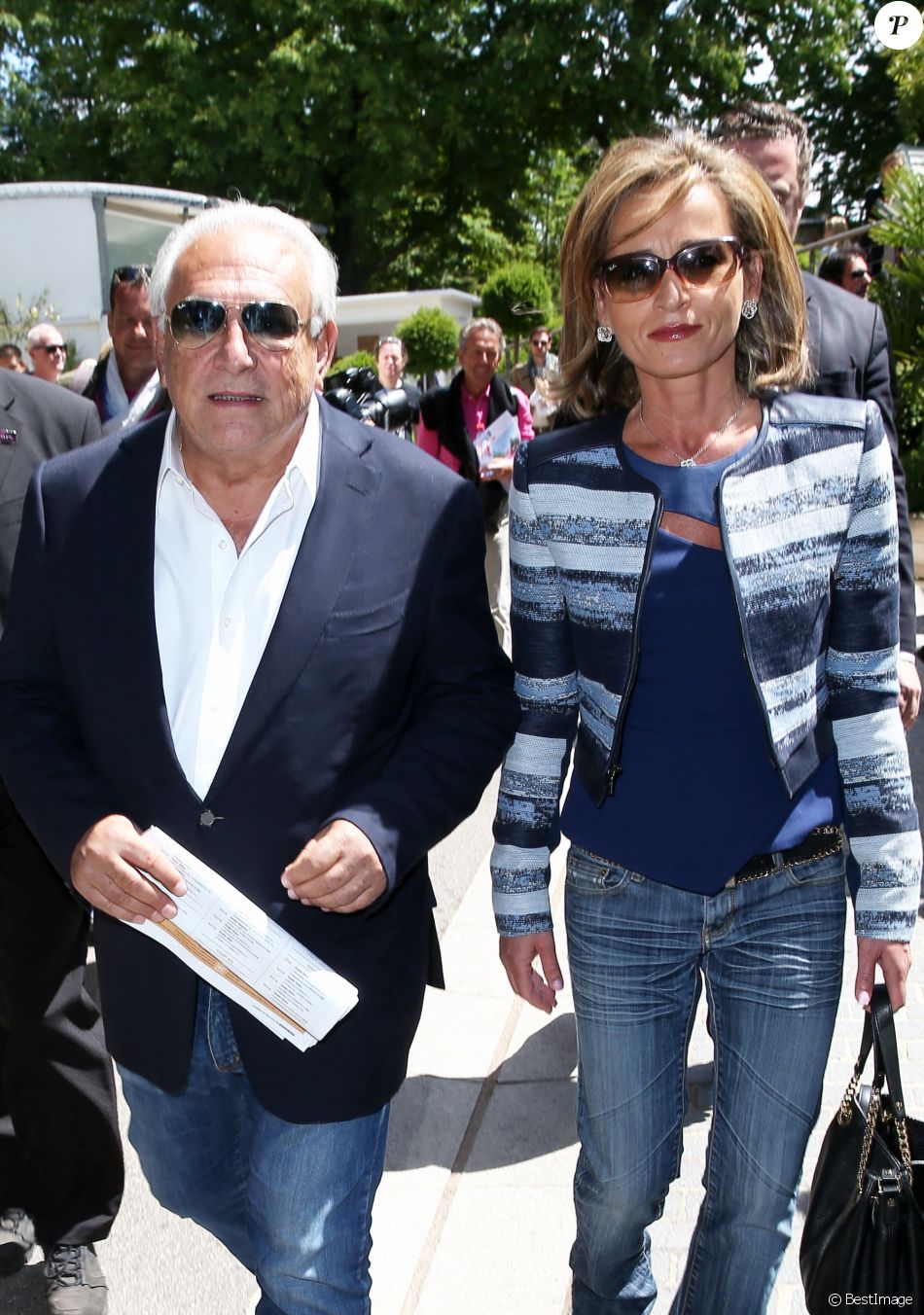 Dominique Strauss Kahn et sa compagne Myriam L'Aouffir aux Internationaux de France de tennis de Roland Garros le 30 mai 2015.
