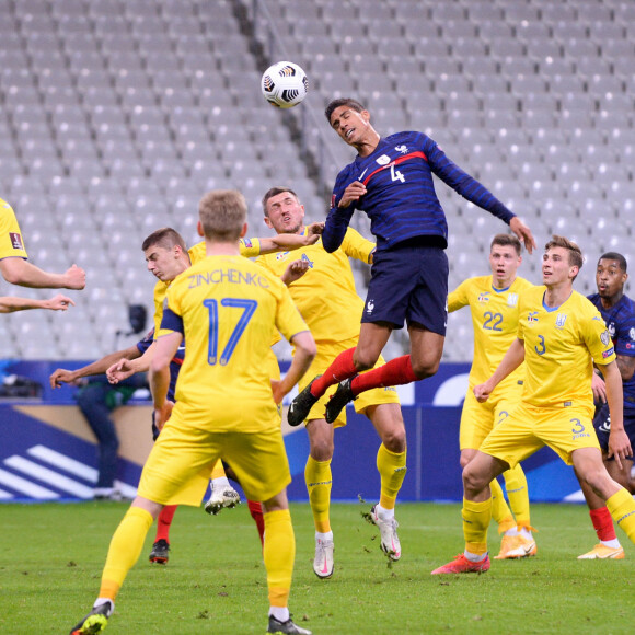 Raphael Varane - Match de football : Eliminatoires coupe du monde 2022 : La France et l'Ukraine font un match nul 1-1 au stade de France à Paris le 24 mars 2021. © Philippe Lecoeur / Panoramic / Bestimage 