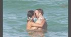 David Guetta dévoile ses abdos : moment complice avec sa chérie Jessica, canon en bikini à la plage