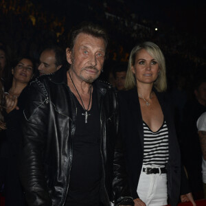 Johnny et Laeticia Hallyday au concert de Patrick Bruel à Bercy le 22 juin 2013.