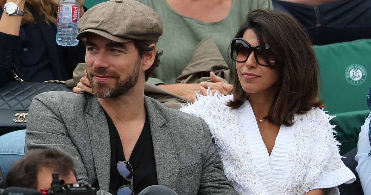 Reem Kherici et son mari Gilles Lemaire dans les tribunes lors des