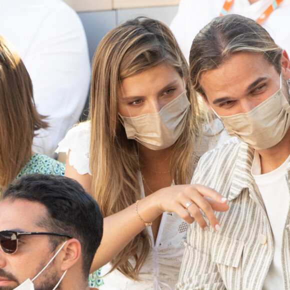 Camille Cerf et son compagnon au village lors des internationaux de France Roland Garros à Paris le 13 juin 2021 / Laurent Zabulon/ABACAPRESS.COM