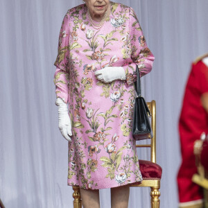 Le président des Etats-Unis Joe Biden et sa femme Jill Biden visitent le château de Windsor en compagnie de la reine Elizabeth II, le 13 juin 2021. 