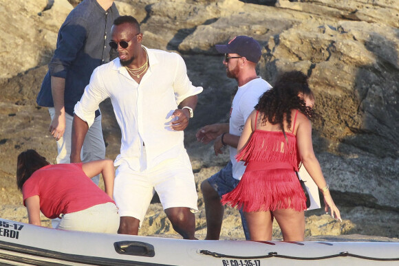 Usain Bolt et sa compagne Kasi J. Bennett sont en vacances à Formentera, Espagne, le 15 août 2019.