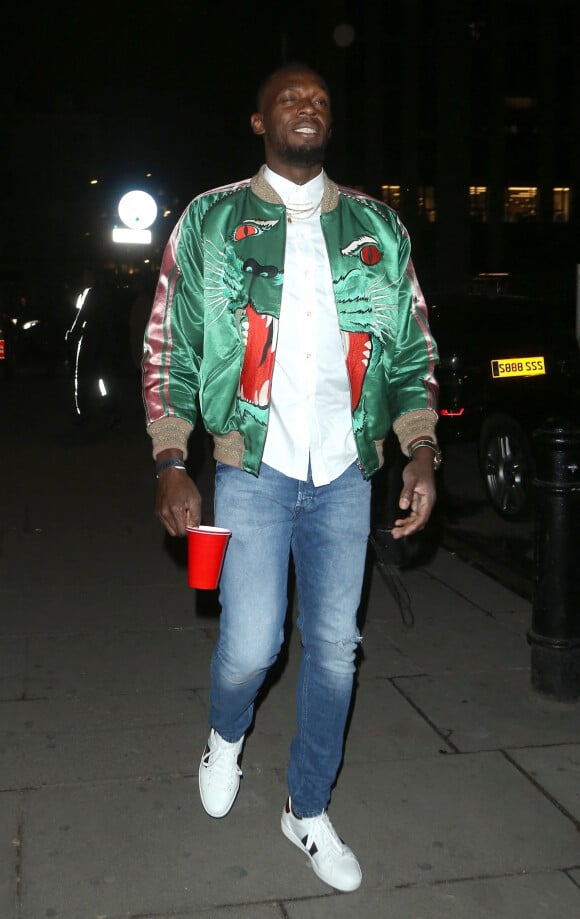 Usain Bolt se rend au club "Tape" à Londres ou il fera la fête jusqu'à 3 heures du matin avec le chanteur Drake le 9 avril 2019.