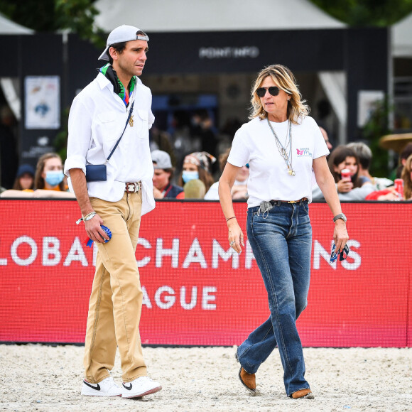 Mika et Virginie Couperie-Eiffel - Les personnalités assistent au Longines Paris Eiffel Jumping au Champ de Mars, le 26 juin 2021.