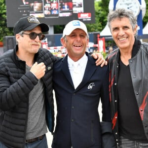 Guilaume Canet (arbore la moustache d'Astérix pour les besoins de son rôle dans "Astérix et Obélix: L'Empire du milieu"), Philippe Rozier et Julien Clerc - Les personnalités assistent au Longines Paris Eiffel Jumping au Champ de Mars, le 27 juin 2021. © Veeren / Bestimage  Celebrities attend Longines Paris Eiffel Challenge. Paris. June 27th, 2021. 