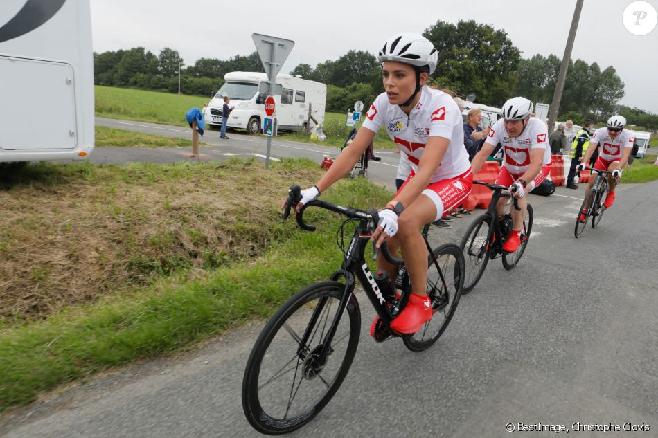Exclusif - Marine Lorphelin (Miss France 2013) et Roger Legeay participent à l'Etape du coeur au profit de l'association "Mécénat Chirurgie Cardiaque" lors du Tour de France 2021 entre Changé et Laval. Le 30 juin 2021. © Christophe Clovis/Bestimage
