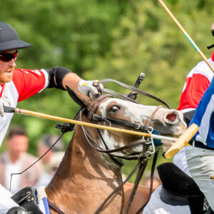 Le prince William, duc de Cambridge et son frère le prince Harry, duc de Sussex lors d'un match de polo de bienfaisance King Power Royal Charity Polo Day à Wokinghan, comté de Berkshire, Royaume Uni, le 10 juillet 2019.