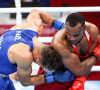 Le boxeur marocain Youness Baalla (en rouge) a affronté le Néo-Zélandais David Nyika en 16e de finale des Jeux Olympiques de boxe, catégorie moins de 91kg.