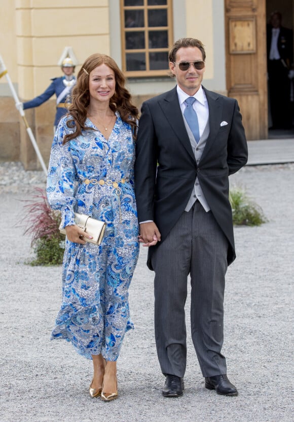 Jesper Ericsson, Nathalie Forslund - La famille royale suédoise au baptême du prince Julian, duc de Halland, au château de Drottningholm sur l'île de Lovön. Ekero. Le 14 août 2021.