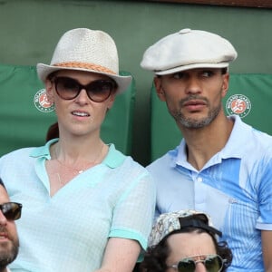 Audrey Fleurot et son compagnon Djibril Glissant assistent à la finale dame lors des Internationaux de France de tennis de Roland Garros à Paris.