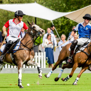 Le prince William, duc de Cambridge et son frère le prince Harry, duc de Sussex lors d'un match de polo de bienfaisance King Power Royal Charity Polo Day à Wokinghan, comté de Berkshire, Royaume Uni, le 10 juillet 2019.