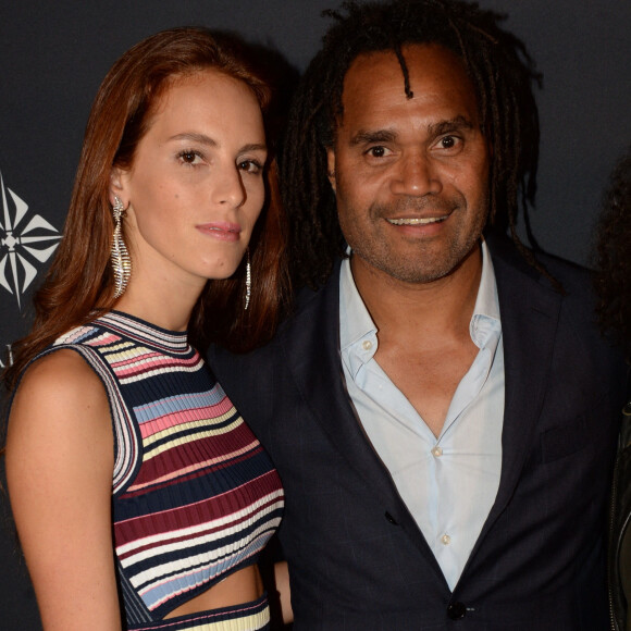 Christian Karembeu et sa femme Jackie Chamoun - A l'occasion des 20 ans de la victoire de l'équipe de France, ils se sont rendus à un dîner organisé au Buddha Bar avec tous les joueurs et leur famille. © Rachid Bellak/Bestimage