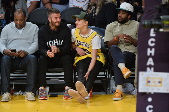 David Beckham et son fils Romeo assistent au match de NBA "Lakers vs Charlotte Hornets" à Los Angeles, le 27 octobre 2019.