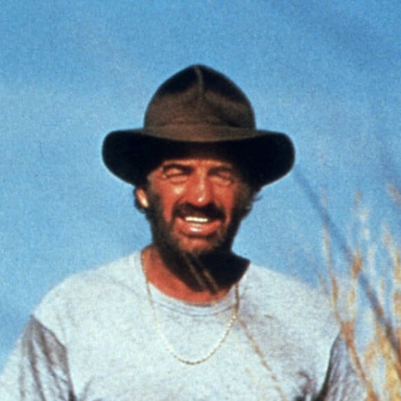 Jean-Paul Belmondo sur le tournage du film "Itinéraire d'un enfant gâté". 1988 