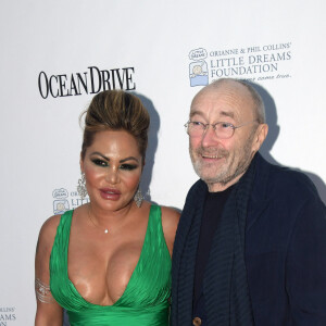Phil Collins et sa femme Orianne au photocall du 4ème gala de la fondation Little Dreams à Miami le 15 novembre 2018.