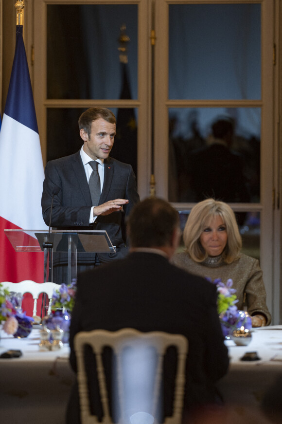 Emmanuel Macron, président de la République et sa femme Brigitte Macron lors du dîner de cloture de la saison Africa 2020 au palais de l'Elysée le 30 septembre 2021.