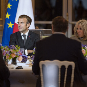 Emmanuel Macron, président de la République et sa femme Brigitte Macron lors du dîner de cloture de la saison Africa 2020 au palais de l'Elysée le 30 septembre 2021.