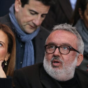 Dominique Farrugia et sa femme Isabelle - Huitième de finale retour entre le Paris Saint-Germain et le Bayer Leverkusen au Parc des Princes remporté par les parisiens sur le score de 2-1 à Paris le 12 mars 2014.