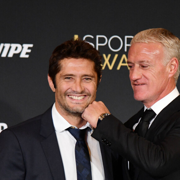 Bixente Lizarazu et Didier Deschamps, sélectionneur et ancien joueur de l'équipe de France de football, durant la soirée des Sportel Awards 2018 au Grimaldi Forum à Monaco le 23 octobre 2018. Les Sportel Awards sont une compétition internationale visant à récompenser les plus belles images de sport de l'année dans le cadre du Sportel qui est un salon international du sport et des médias qui se déroule sur 3 jours en Principauté. © Bruno Bebert/Bestimage