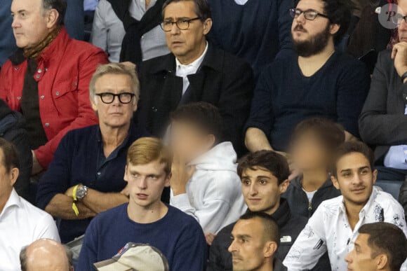 Franck Dubosc et ses enfants Raphael et Milhan - People au Match de Ligue de champions Psg (3) - Leipzig (2) au Parc des Princes à Paris le 19 octobre 2021. © Cyril Moreau/Bestimage