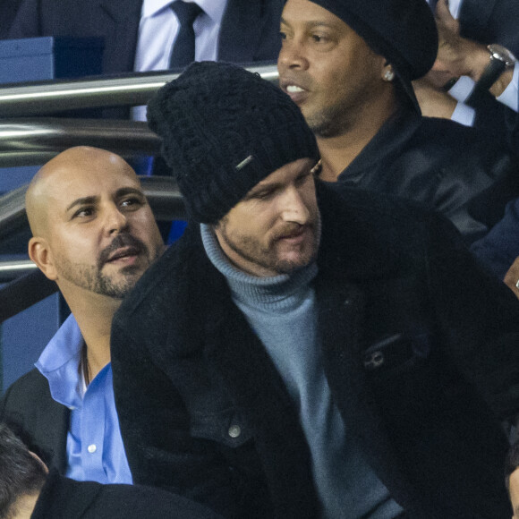Philippe Lacheau, Ronaldinho - People au Match de Ligue de champions Psg (3) - Leipzig (2) au Parc des Princes à Paris le 19 octobre 2021. © Cyril Moreau/Bestimage