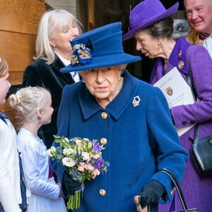 La reine Elisabeth II d'Angleterre et la princesse Anne arrivent à un service d'action de grâce à l'abbaye de Westminster pour marquer le centenaire de la Royal British Legion, à Londres.