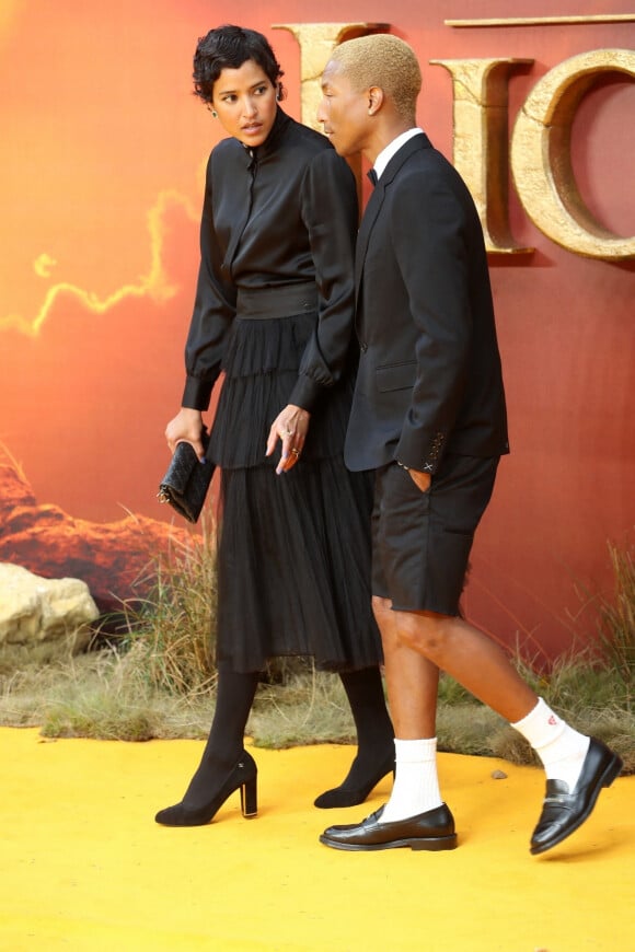 Pharrell Williams et sa femme Helen Lasichanh à la première du film "Le Roi Lion" au cinéma Odeon Luxe Leicester Square à Londres, le 14 juillet 2019.