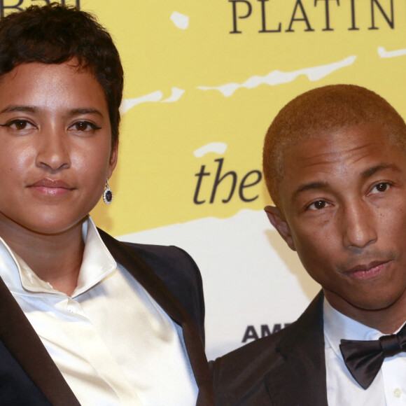 Helen Lasichanh et son mari Pharrell Williams au photocall de la soirée "The Yellow Ball" organisée par American Express Platinum et Pharrell Williams au Brooklyn Museum à New York, le 10 septembre 2018.