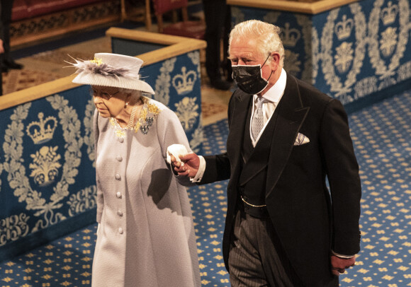 La reine Elisabeth II d'Angleterre et le prince Charles, prince de Galles - La reine d'Angleterre va prononcer son discours d'ouverture de la session parlementaire à la Chambre des lords au palais de Westminster à Londres, Royaume Uni, le 11 mai 2021. 