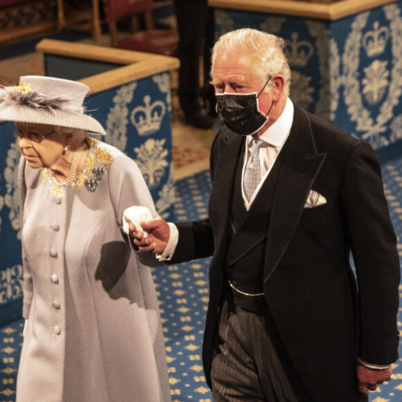 La reine Elisabeth II d'Angleterre et le prince Charles, prince de Galles - La reine d'Angleterre va prononcer son discours d'ouverture de la session parlementaire à la Chambre des lords au palais de Westminster à Londres, Royaume Uni, le 11 mai 2021. 