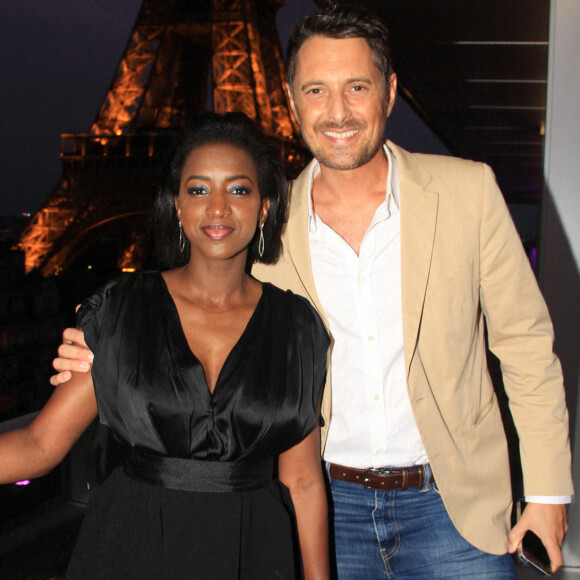 Exclusif - Hapsatou Sy et son mari Vincent Cerruti - Le Grand Dîner du 14 juillet, sur le rooftop de l'hôtel Pullman Tour Eiffel à Paris, France, le 14 juillet 2021. © Philippe Baldini/Bestimage