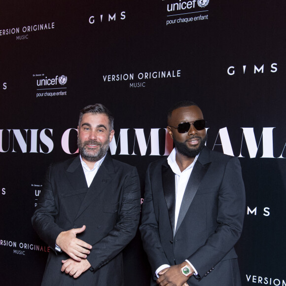 Gims et Jacques Saadia au photocall de la soirée "Unis comme jamais" au profit de l'Unicef, au pavillon Cambon à Paris. Le 8 novembre 2021. Le chanteur Gims a récolté 1 500 000 € pour l'Unicef France. © Pierre Perusseau / Bestimage