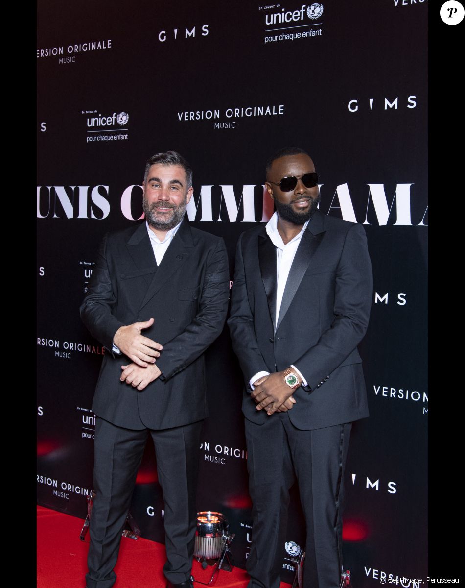 Gims et Jacques Saadia au photocall de la soirée "Unis comme jamais" au profit de l'Unicef, au pavillon Cambon à Paris. Le 8 novembre 2021. Le chanteur Gims a récolté 1 500 000 € pour l'Unicef France. © Pierre Perusseau / Bestimage