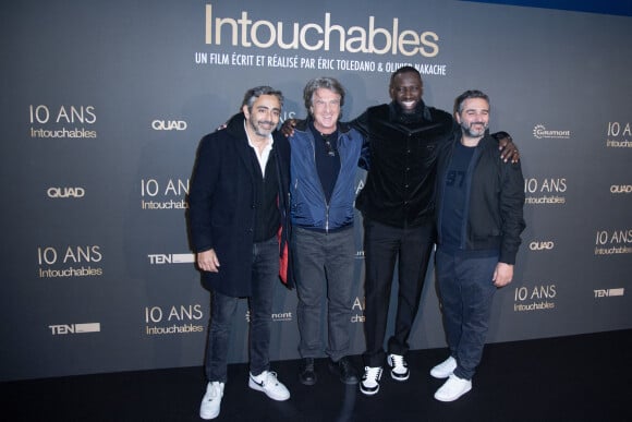 Eric Toledano, François Cluzet, Omar Sy et Olivier Nakache - 10e anniversaire du film "Intouchables" au cinéma UGC Normandie de Paris. Le 15 novembre 2021. @ Aurore Marechal/ABACAPRESS.COM