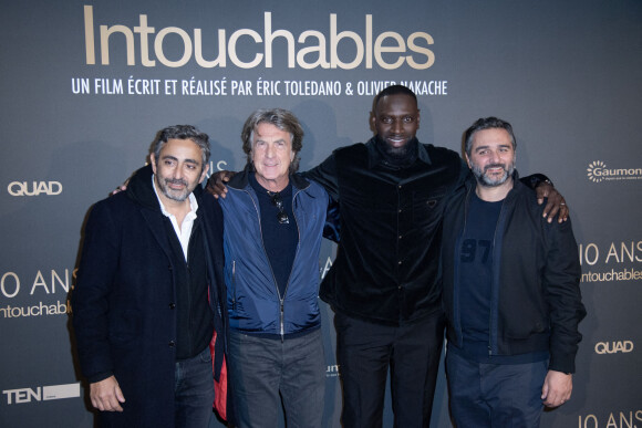 Eric Toledano, François Cluzet, Omar Sy et Olivier Nakache - 10e anniversaire du film "Intouchables" au cinéma UGC Normandie de Paris. Le 15 novembre 2021. @ Aurore Marechal/ABACAPRESS.COM