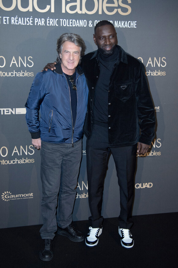 François Cluzet et Omar Sy - 10e anniversaire du film "Intouchables" au cinéma UGC Normandie de Paris. Le 15 novembre 2021. @ Aurore Marechal/ABACAPRESS.COM