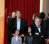 Sébastien Auzière, fils de Brigitte Macron, lorsque le président Emmanuel Macron a reçu le collier de Grand maître de la Légion d'honneur dans la Salle des fêtes du palais de l'Elysée à Paris