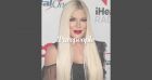 Tori Spelling tout sourire en body et bas résilles face à Sarah Michelle Gellar chaudement vêtue