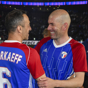 Youri Djorkaeff, Zinédine Zidane et Roger Lemerre - Les Bleus de France98 se sont imposés (3-2) face à une sélection FIFA 98 pour le match des légendes pour l'anniversaire des 20 ans du sacre mondial à la U Arena à Nanterre, France. © Bestimage